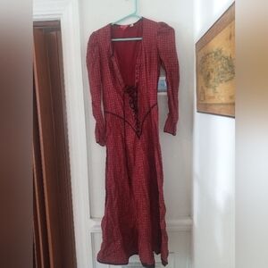 A long sleeve lace up the front dress from the 1980s Renaissance festival